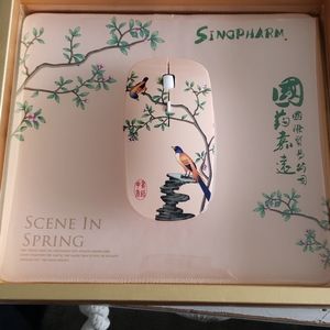 Themed wireless mouse and mouse pad